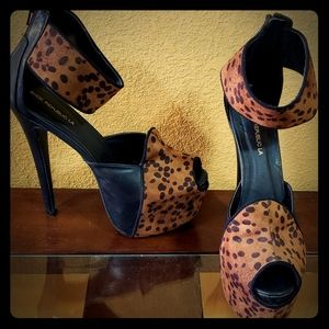 Black & cheetah print platform stiletto.